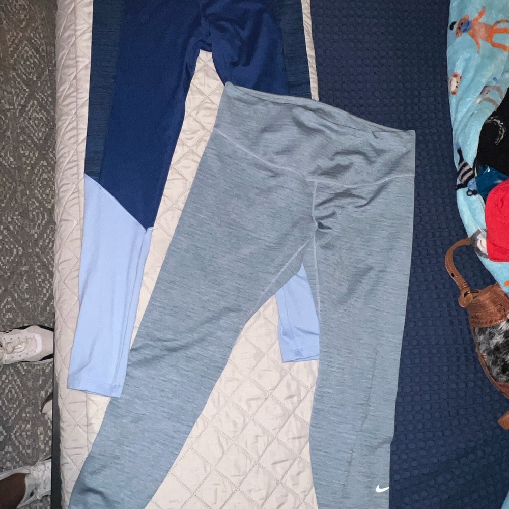 Nike leggings and BCG leggings selling both together. Both fit as a large